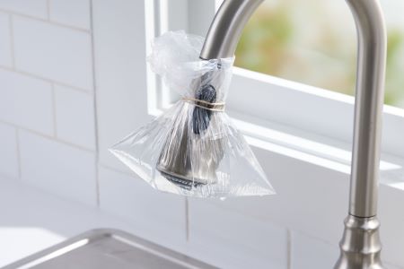 Reinigen badkamerkraan huismiddel in laten weken