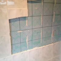 Badkamer tegels over tegels
